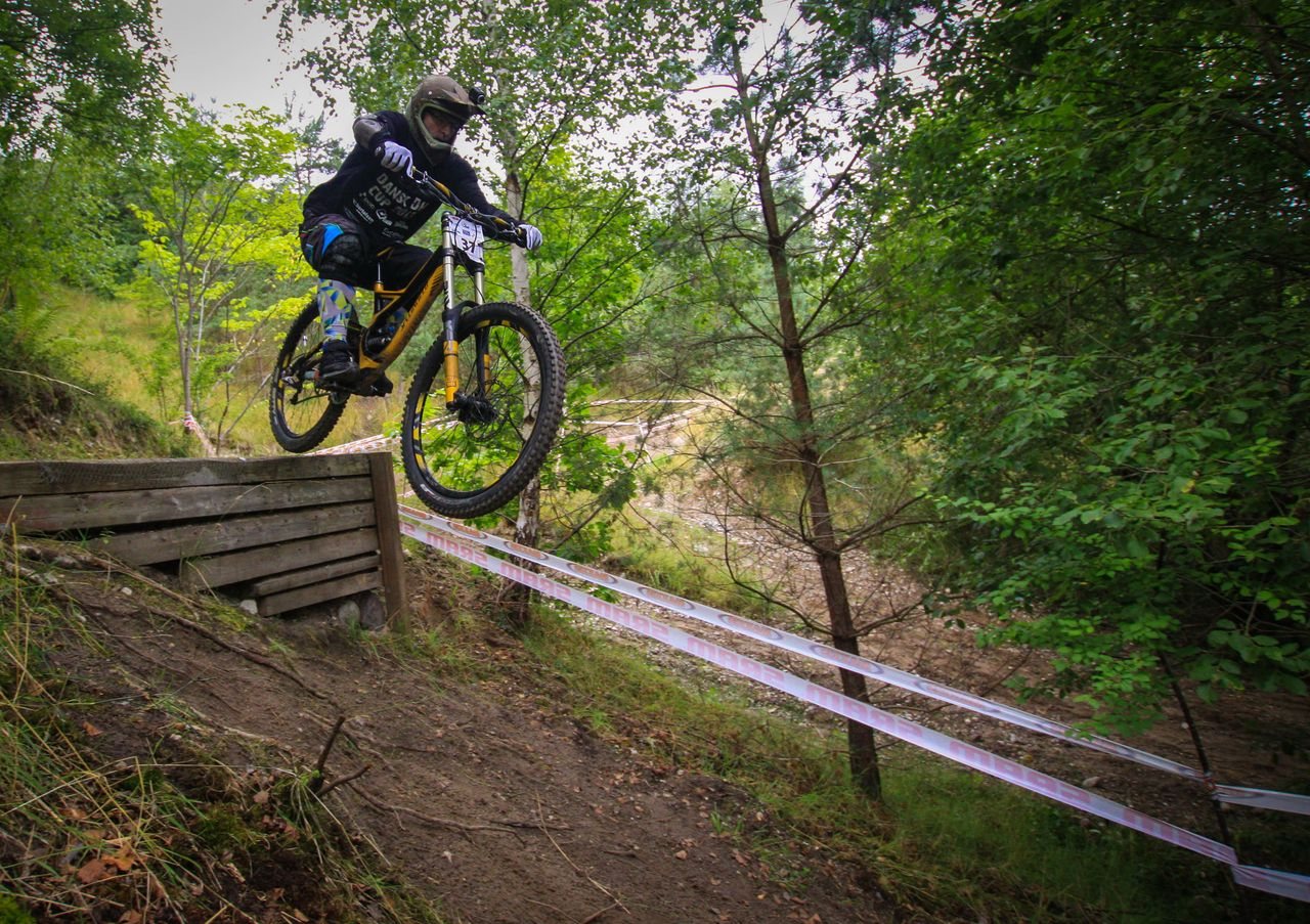 Jeremy jumping a downhill mountain bike, 2010